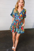 Load image into Gallery viewer, Navy Tropical Floral Surplice Romper