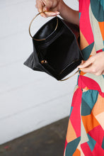 Load image into Gallery viewer, Black Fold Over Gold O-Ring Faux Leather Clutch Bag
