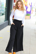 Load image into Gallery viewer, Relaxed Fun Black Smocked Waist Palazzo Pants
