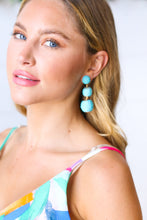 Load image into Gallery viewer, Azure Raffia Lantern Pom Dangle Earrings
