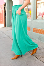 Load image into Gallery viewer, Just Dreaming Emerald Smocked Waist Palazzo Pants
