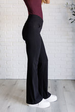 Load image into Gallery viewer, Building Habits Twill Flared Crossover Waist Pant in Black
