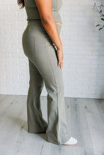 Load image into Gallery viewer, Building Habits Twill Flared Crossover Waist Pant in Dusty Olive
