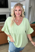 Load image into Gallery viewer, Airflow Peplum Ruffle Sleeve Top in Sage
