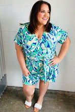 Load image into Gallery viewer, Green &amp; Blue Geometric Print Surplice Romper
