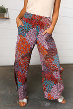 Load image into Gallery viewer, Burnt Orange Geo Print Smocked Waist Slit Palazzo Pants
