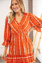 Load image into Gallery viewer, Persimmon Stripe Floral Surplice Fit &amp; Flare Ruffle Dress
