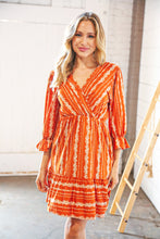 Load image into Gallery viewer, Persimmon Stripe Floral Surplice Fit &amp; Flare Ruffle Dress
