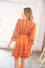 Load image into Gallery viewer, Persimmon Stripe Floral Surplice Fit &amp; Flare Ruffle Dress
