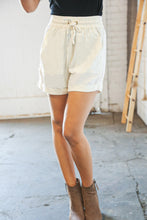 Load image into Gallery viewer, Bone Linen Drawstring Cuffed Shorts with Pockets

